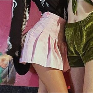 Pink pleated skater skirt